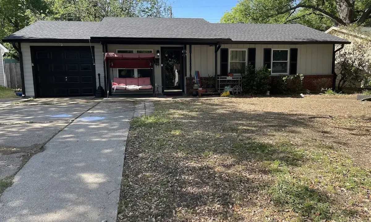 Asphalt Shingle Roof Repair crew at work on a residential roof in Summerville